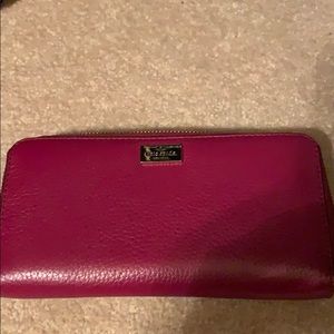 Pink leather Kate Spade zip around wallet